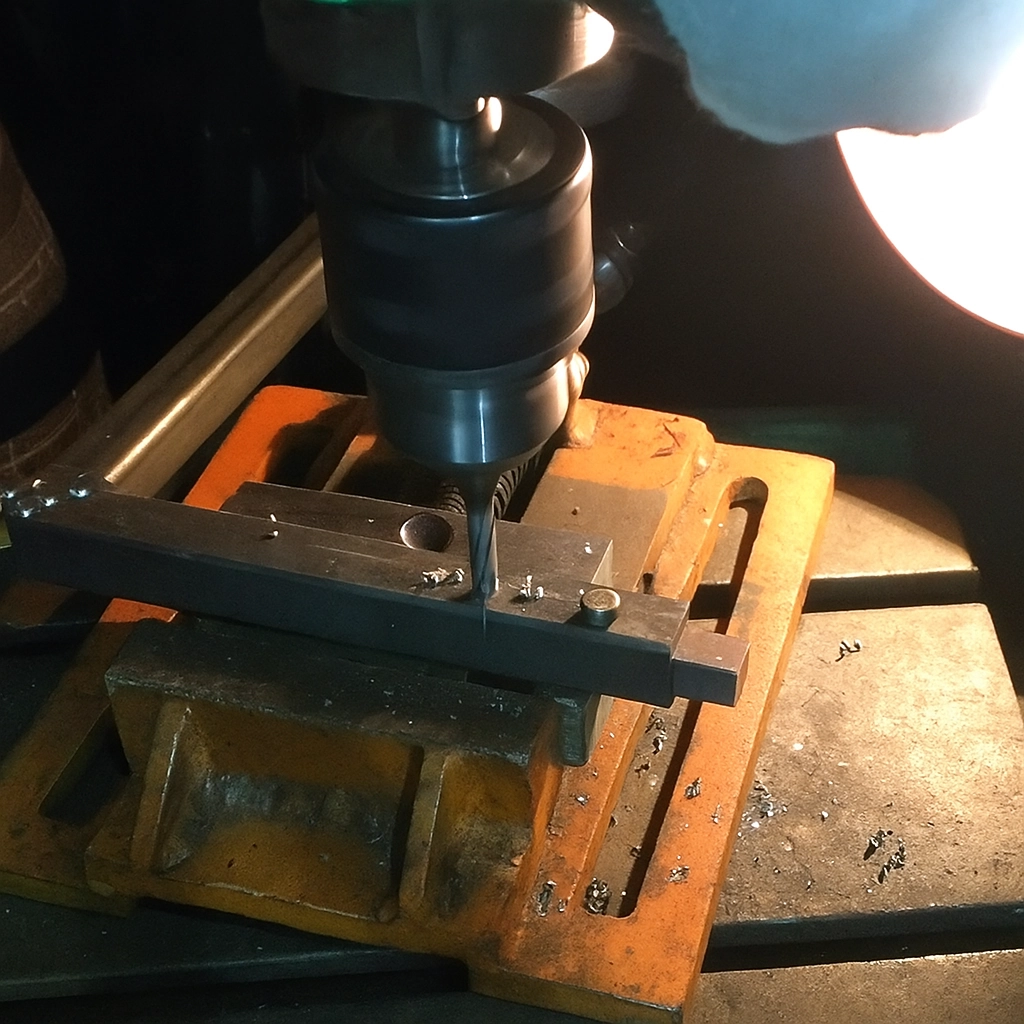Drill accurate mounting holes in metal frame pieces for secure roller installation.
