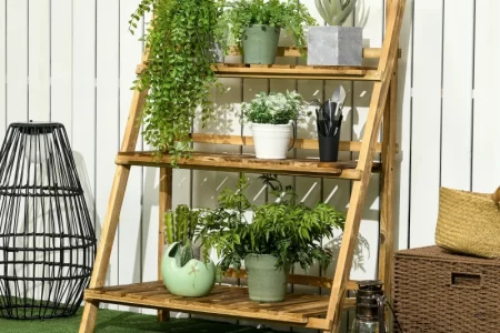 Plant stand in lawn with beautiful pots