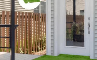 Fully installed artificial grass on patio with circular inset showing rolled synthetic turf sample.