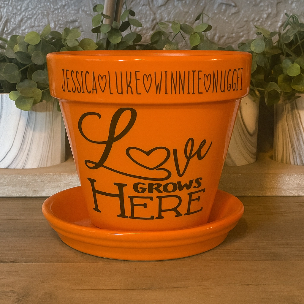 Orange pot personalized with names and ‘Love Grows Here’ quote
