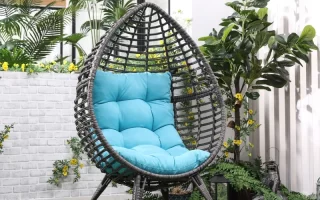 Egg chair with blue cushion