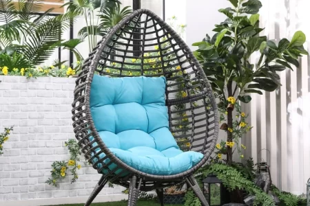 Egg chair with blue cushion