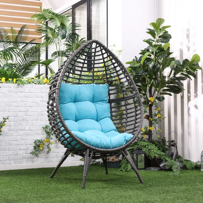 Egg chair with blue cushion