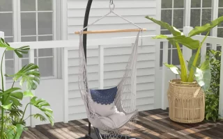 stylish hammock chair arranged in a bright, modern indoor setting.
