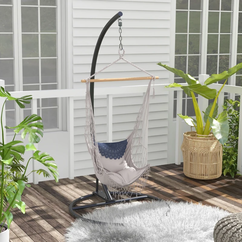 stylish hammock chair arranged in a bright, modern indoor setting.