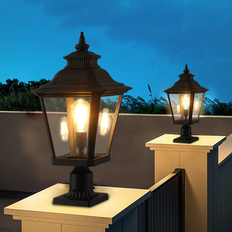 Elegant outdoor post lantern lights illuminating a garden path at dusk.