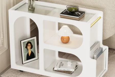 stylish side tables in a modern living room setup with plants and books.