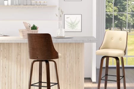 Stylish modern bar stools in wood and leather beside a kitchen island with window view.