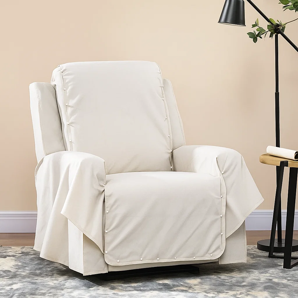 Neutral fabric draped and pinned over recliner to create a custom fit before sewing.
