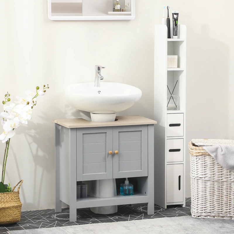 Light grey vanity cabinet with beige countertop and vessel sink next to a tall organizer shelf.