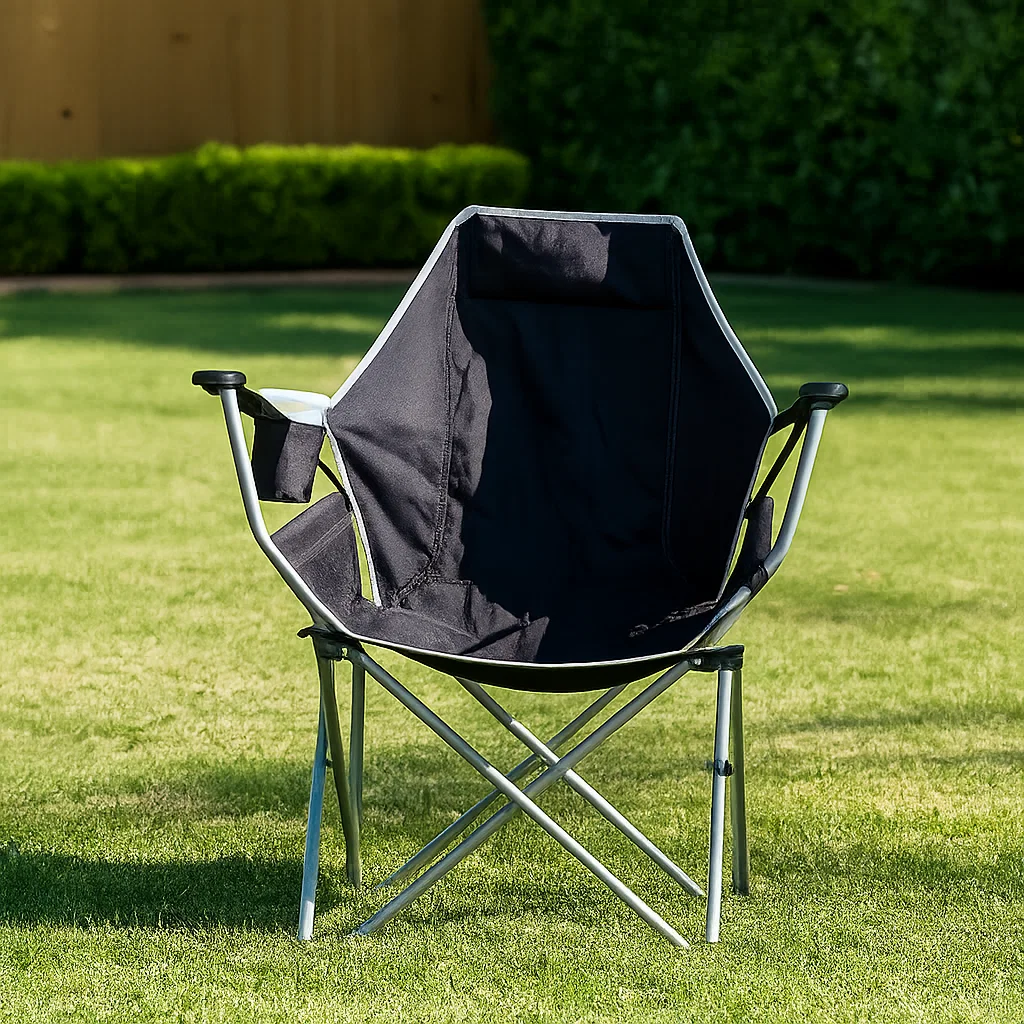 Lightweight hammock chair set up outdoors in a backyard, ideal for camping.
