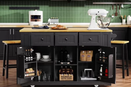 Kitchen island with storage and prep space for cooking.