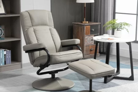 Modern living room with a beige recliner chair near window and indoor plant.