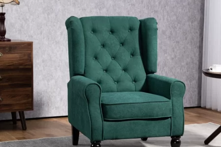 Green upholstered accent chair with button tufting in a modern living room