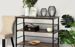 Console table with earthy textures, sculptural decor, and framed minimal line art in warm tones.