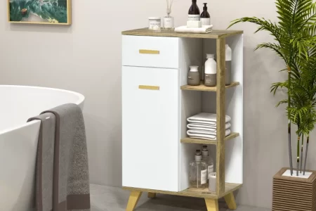Mid-century style bathroom cabinet with open shelves, towels, toiletries, and a decorative plant beside the tub.
