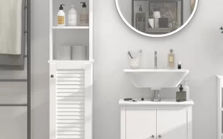 Modern bathroom with white cabinet, open shelving, round mirror, and organized toiletries.