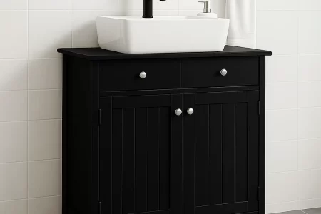 Black bathroom vanity with double doors and two drawers, topped with a white sink and faucet.