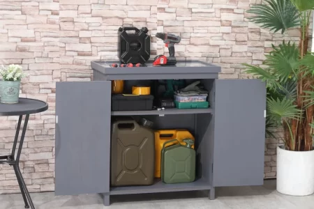 Open cabinet with tools and cans showing how to organize and weatherproof outdoor storage