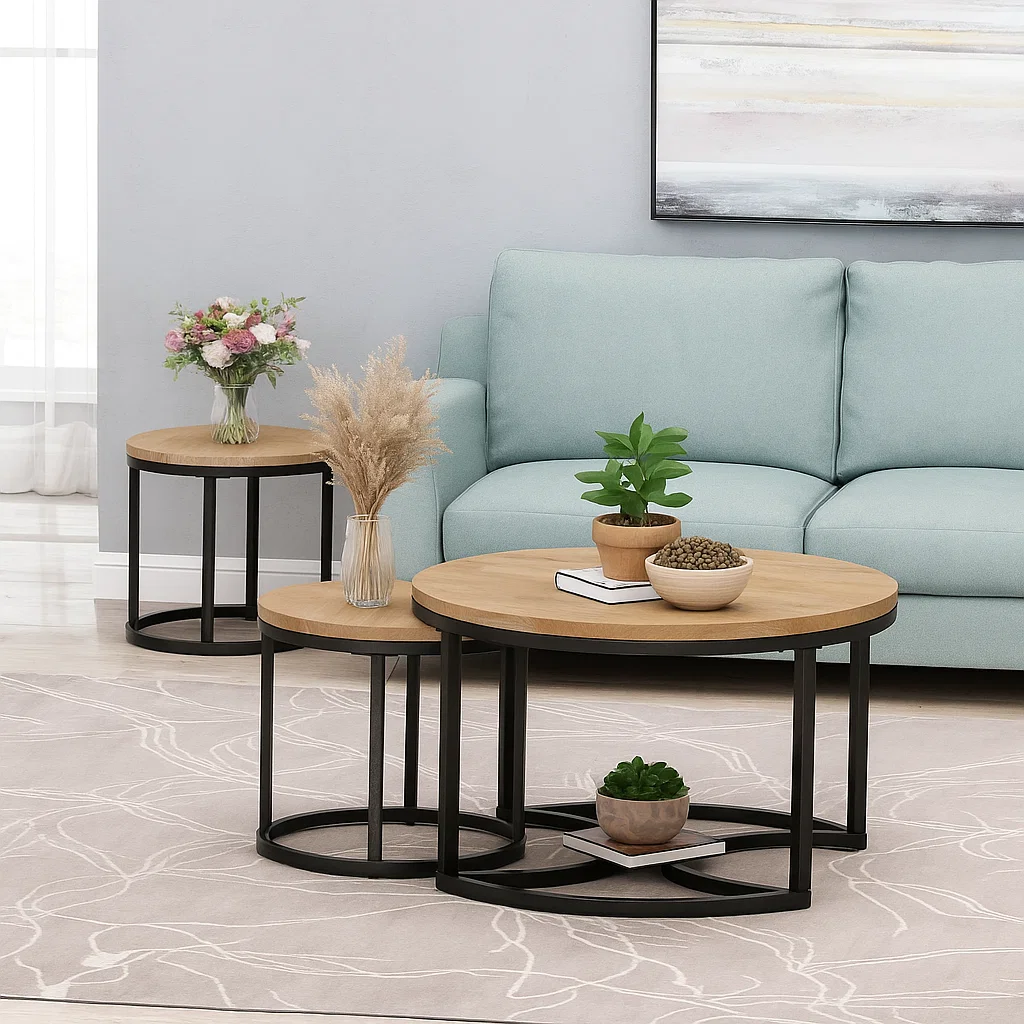 Coffee table with layered natural elements like potted plants, pampas grass, and earthy-toned decor.
