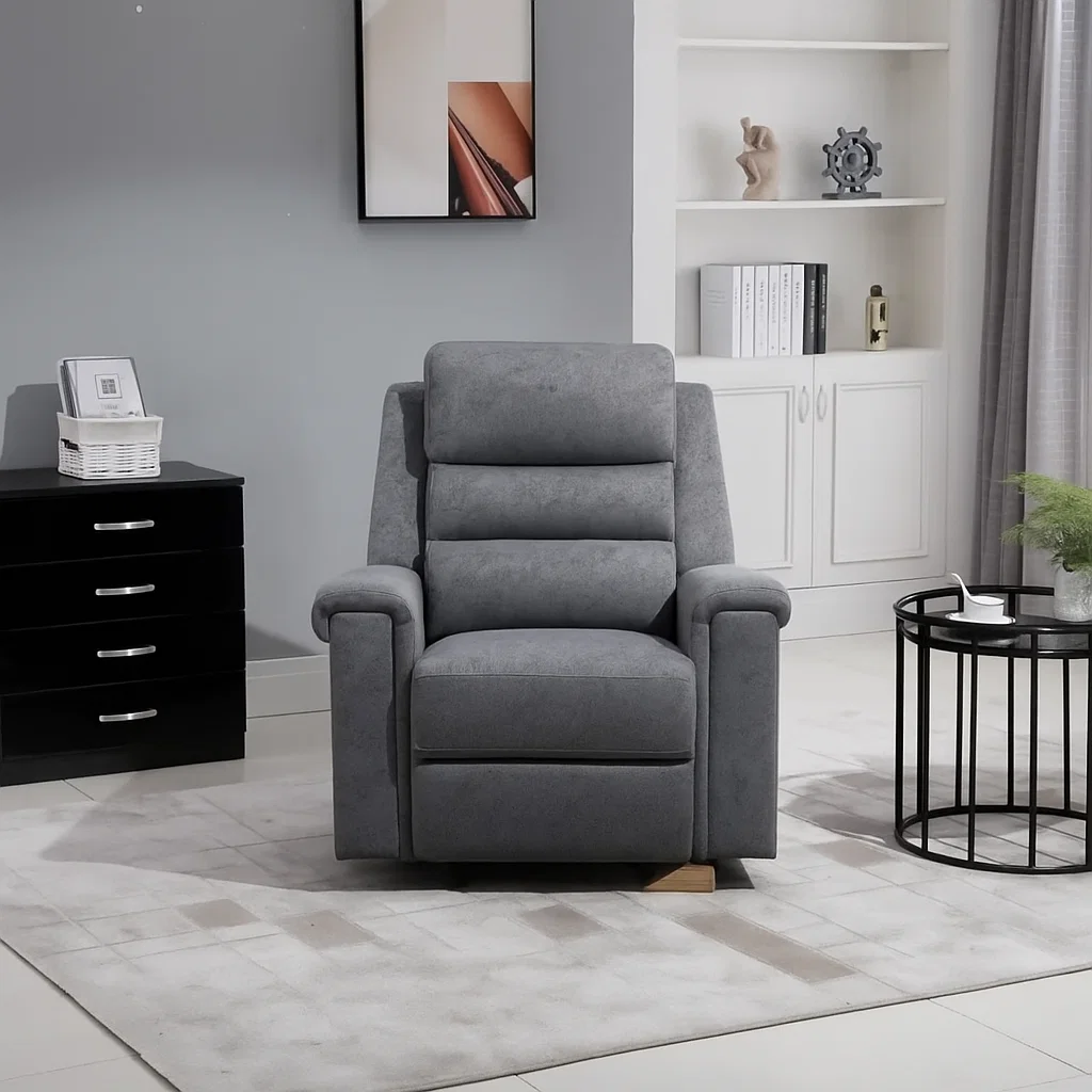 Recliner with a wedge block placed underneath to prevent movement.