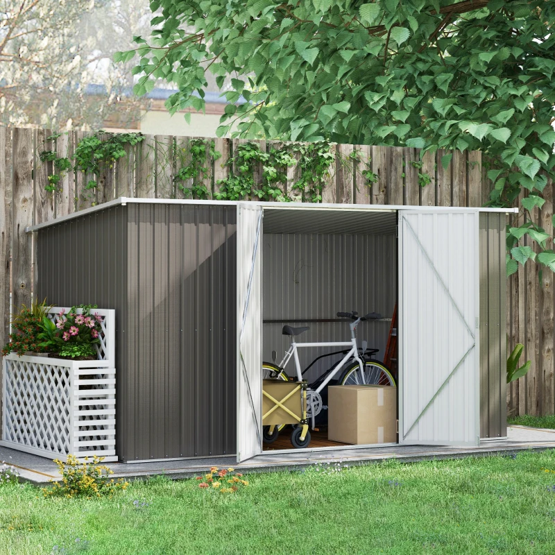 Dark grey metal shed with garden plants and a bike stored inside.