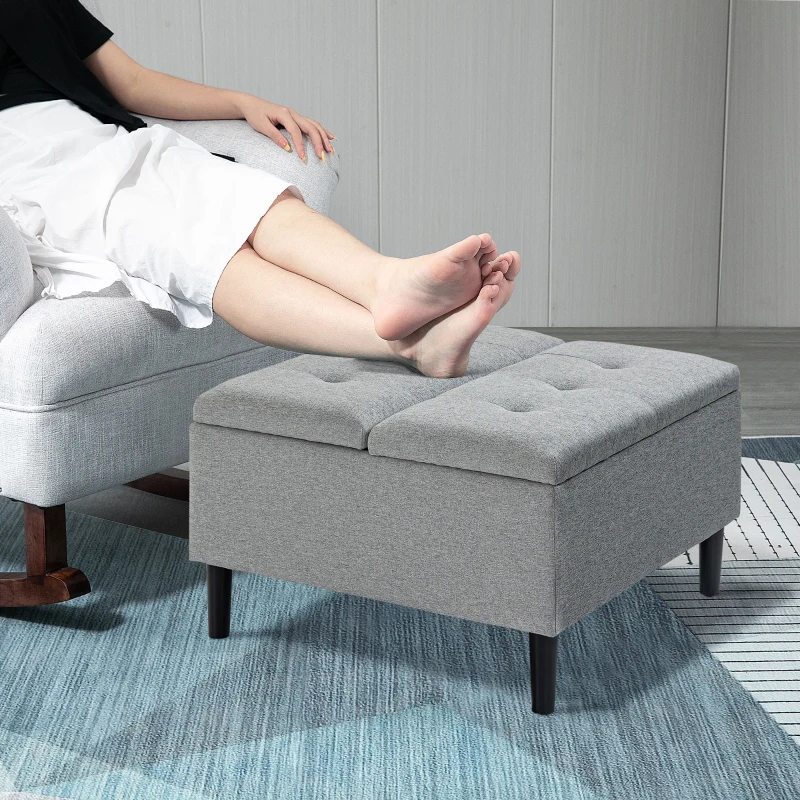 Comfortable ottoman and cozy beige sofa with matching coffee table.
