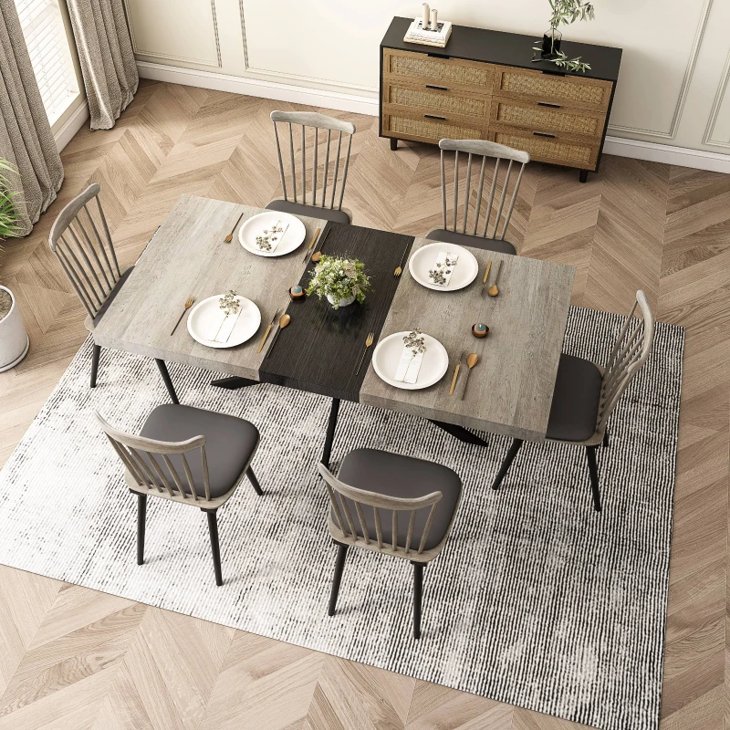 Traditional rectangular dining table set with centerpiece and six matching wood chairs in classic decor