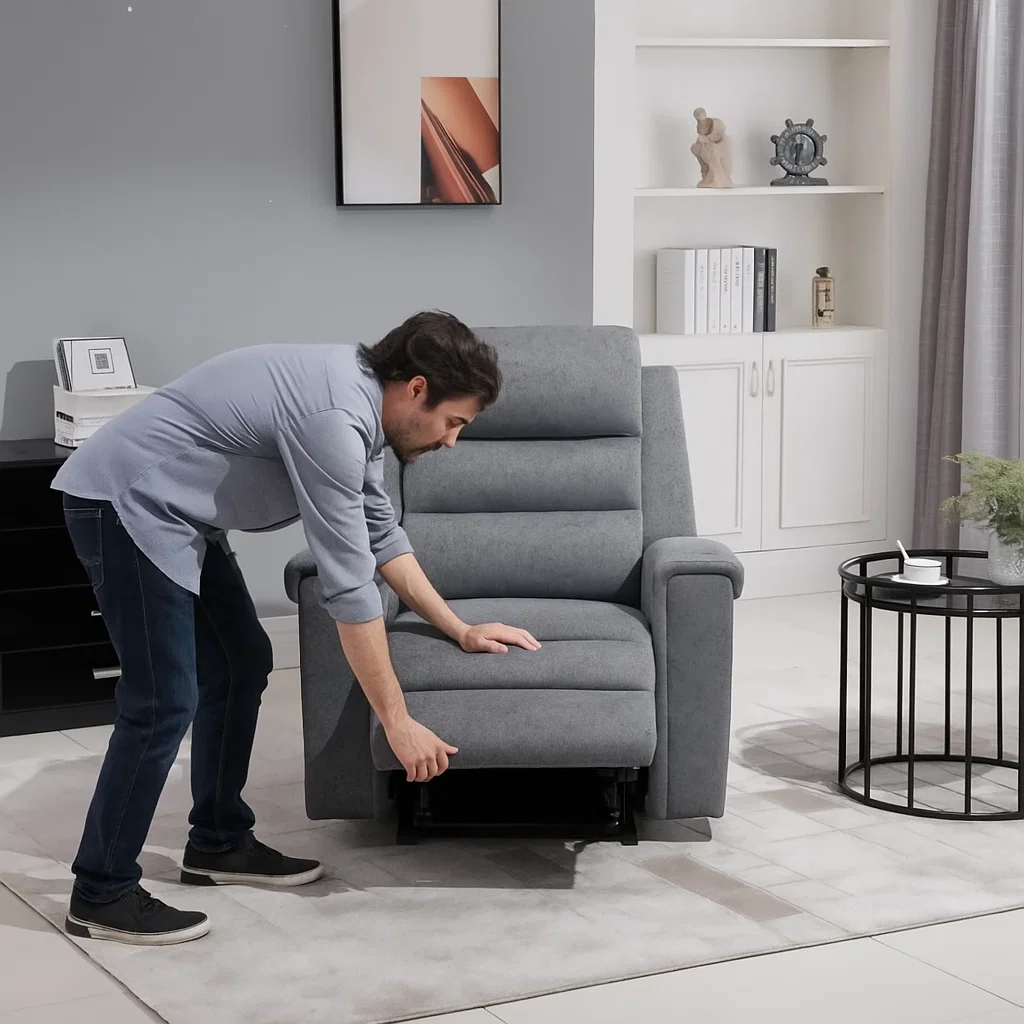 Person checking recliner base for adjusting the instability. 