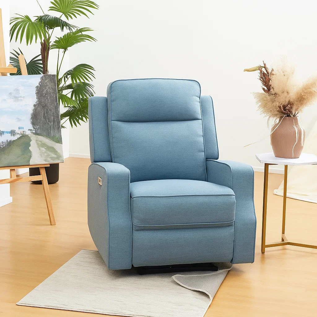 Blue recliner sitting on a light area rug with non-slip pad exposed beneath for extra stability.