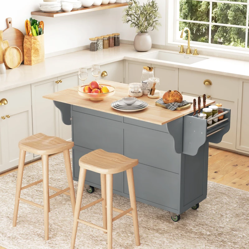 Kitchen island with breakfast bar and seating area.