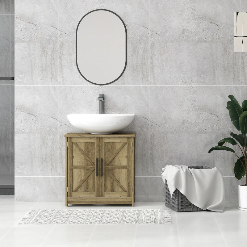 Modern bathroom with light wood vanity and oval mirror, accented by greenery and a woven basket.
