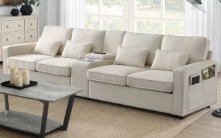 Neutral-toned sectional sofa with side pocket armrests in cozy setting.