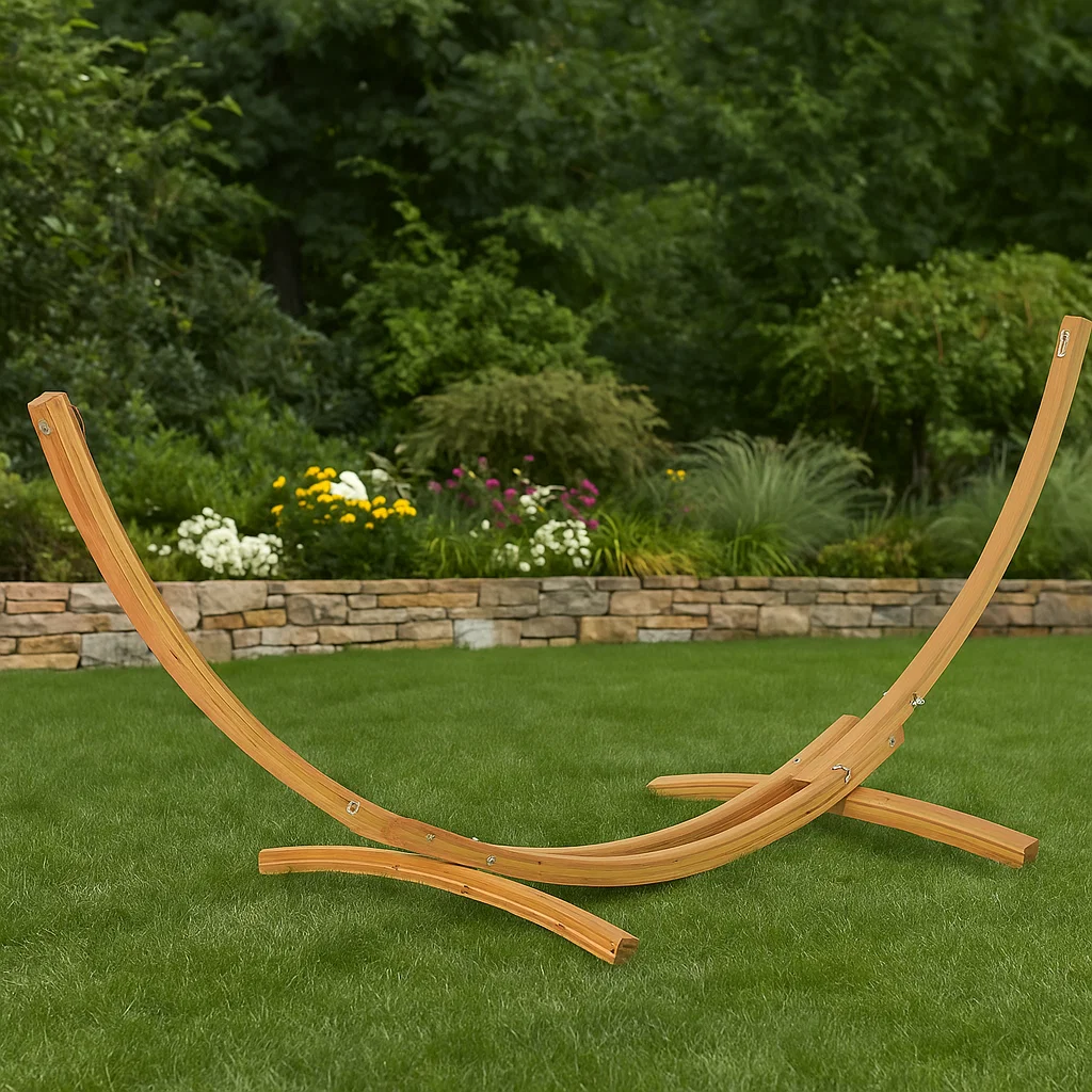 Curved wooden hammock stand on lawn emphasizing sturdy, aesthetic support for outdoor hammocks.