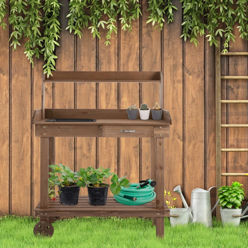 Mobile wooden potting bench with wheels and multiple storage shelves.