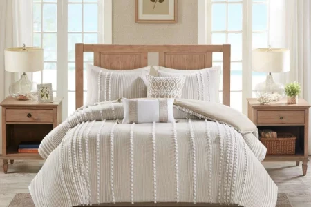 Cozy neutral striped bedding set with multiple pillows