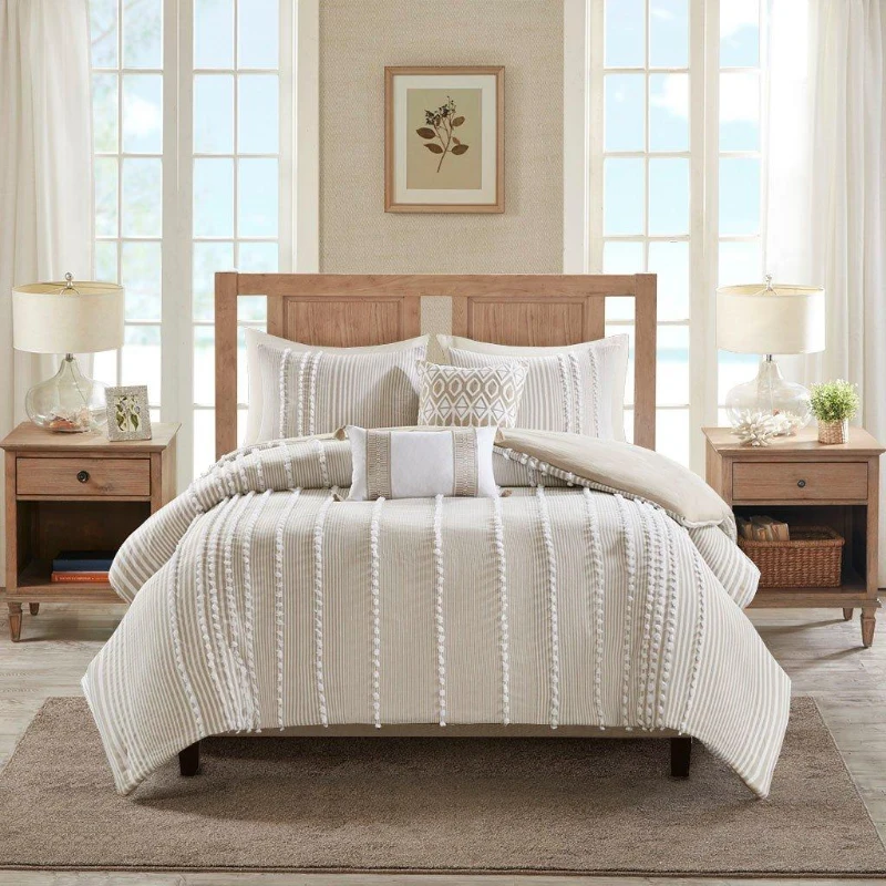 Cozy neutral striped bedding set with multiple pillows
