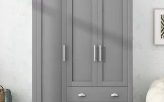 Grey wardrobe with drawers styled with home decor accents.