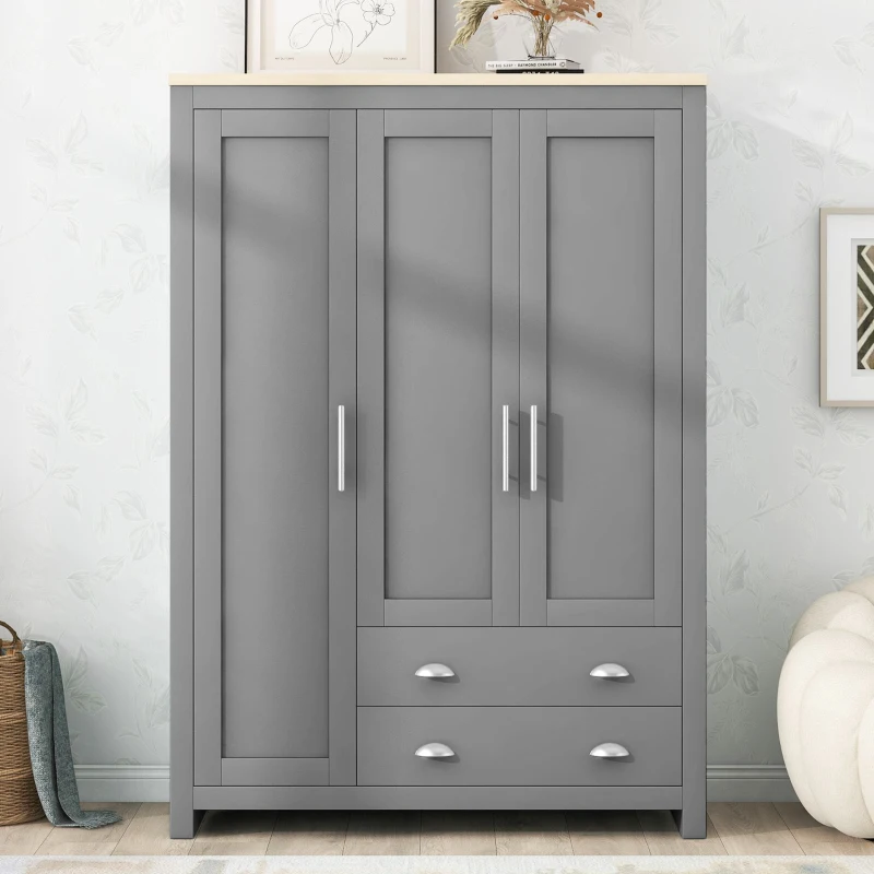 Grey wardrobe with drawers styled with home decor accents.