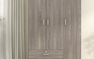 Large wooden wardrobe with three doors and bottom drawers