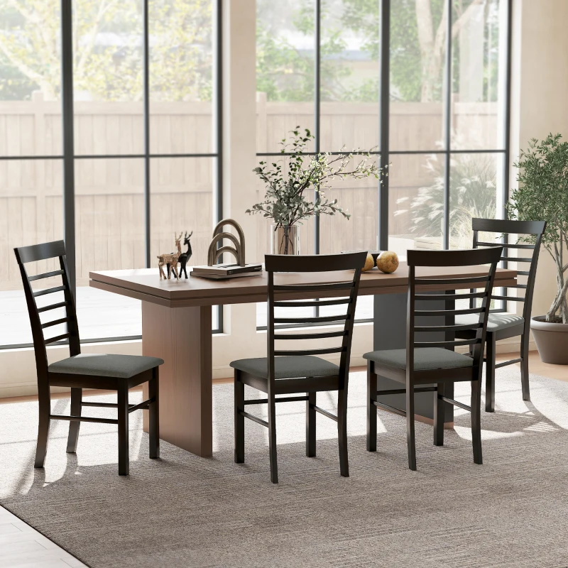 Modern ladder-back black wood dining chairs with fabric seats surrounding a rectangular table in a sunlit room.