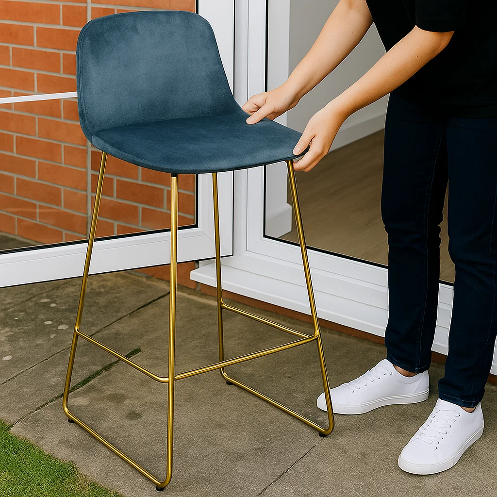 Person air drying velvet bar stool indoors