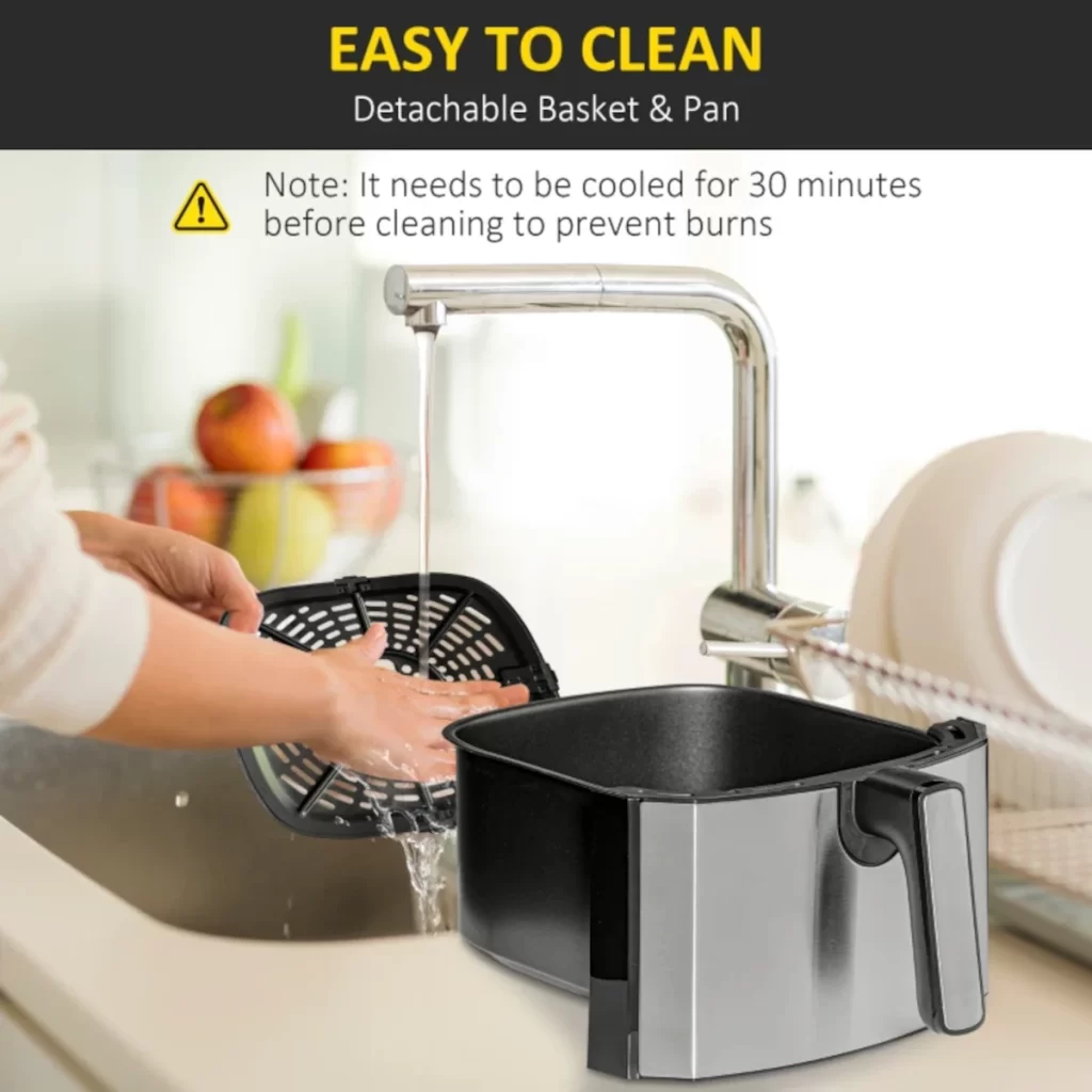 Washing detachable air fryer basket and pan under sink water.