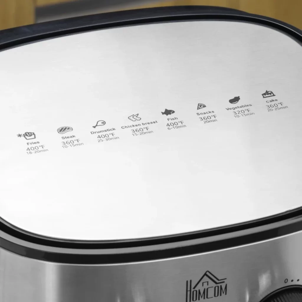 Close-up of preset cooking guide on silver digital air fryer.