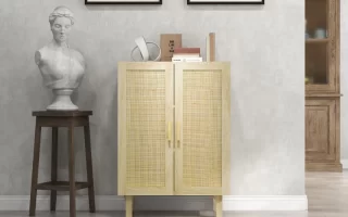Painted wooden cabinet displayed in a styled room with wall art, bust statue, and neutral decor.
