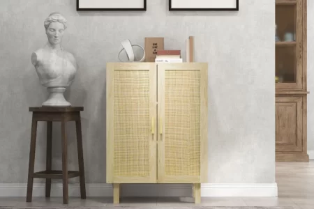 Painted wooden cabinet displayed in a styled room with wall art, bust statue, and neutral decor.