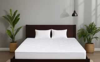 Clean mattress on a dark wood bed with white bedding