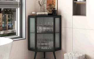 Black corner cabinet styled in a modern bathroom setting.