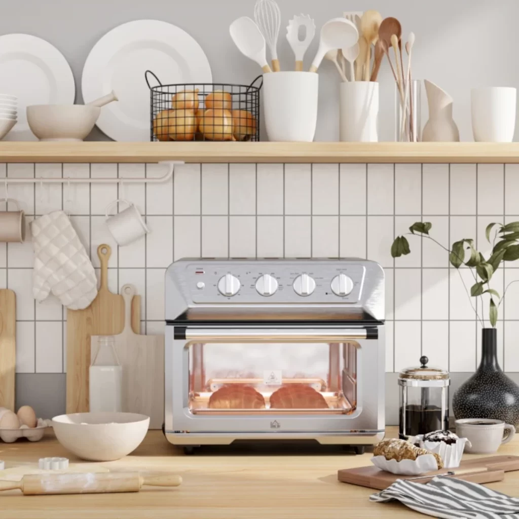 Countertop oven-style air fryer baking pastries in kitchen.