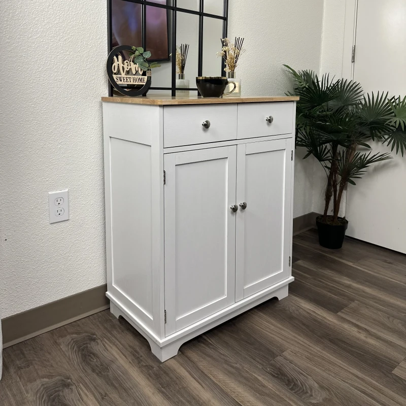  White storage cabinet with two drawers and doors.

